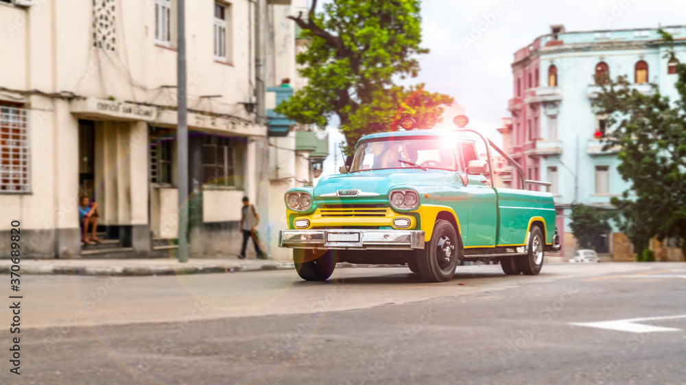 Havana, Cuba. Cars on the vibrant city`s streets.