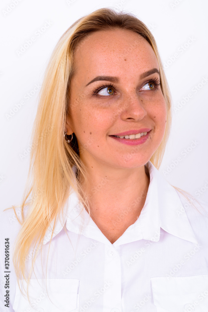 Portrait of happy young beautiful businesswoman with blond hair