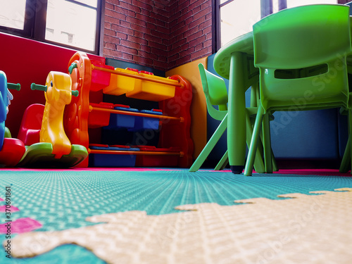 Children's playground, playroom with plastic colorful educational, preschoolers kindergarten toys kid.