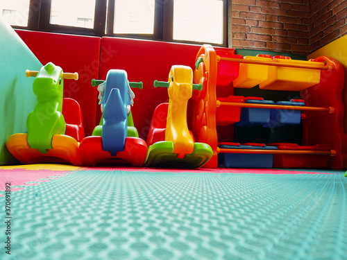 Children's playground, playroom with plastic colorful educational, preschoolers kindergarten toys kid.
