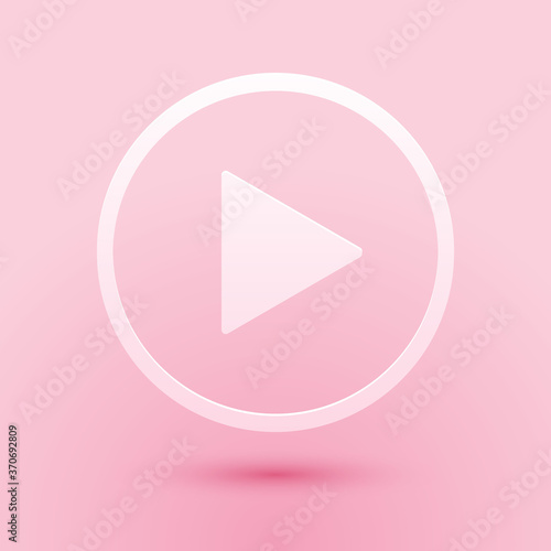 Paper cut Play icon isolated on pink background. Paper art style. Vector.