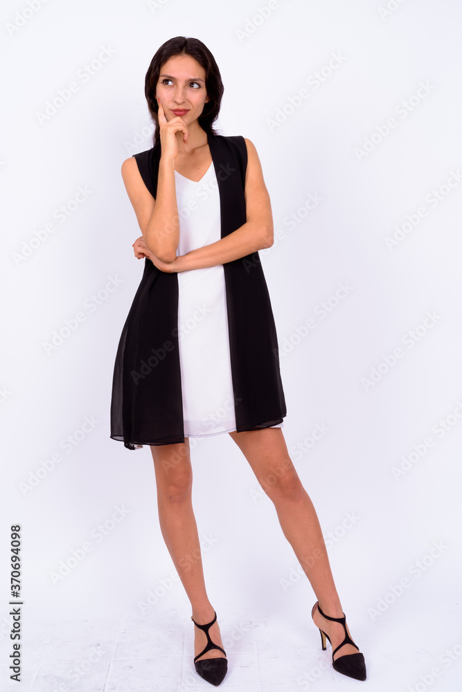 Portrait of young beautiful businesswoman against white background Portrait of young beautiful businesswoman against white background