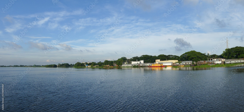 Daylight and sky view of the beautiful river. ferry platoon view in daylight. Daylight and sky view of the beautiful river. ferry platoon view in daylight.