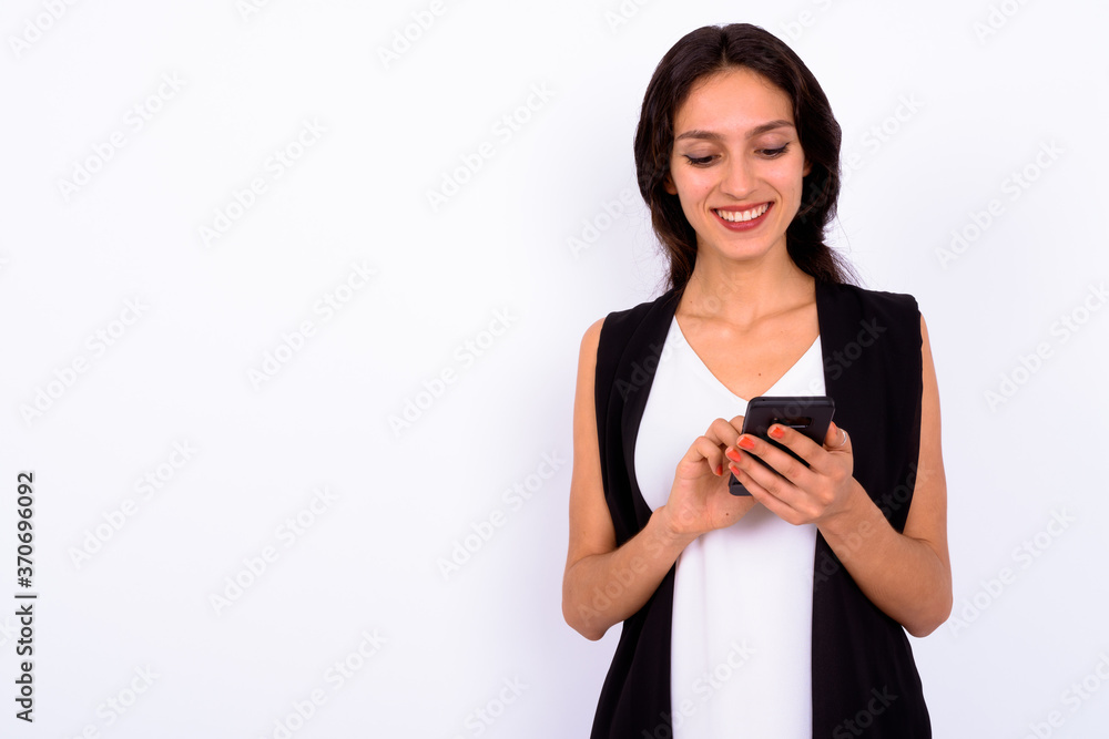 Portrait of happy young beautiful businesswoman using phone Portrait of happy young beautiful businesswoman using phone