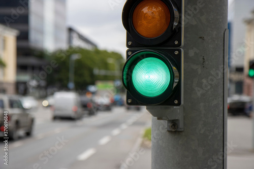 Traffic sign. Green traffic light.