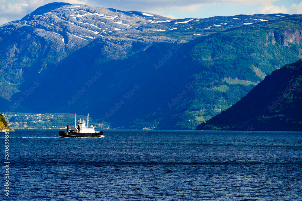 Fjord landscape with ferry, Norway