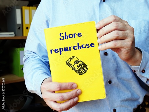 Financial concept about Share repurchase with inscription on the piece of paper.