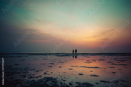Friends on a beach after Covid19 © Gautam