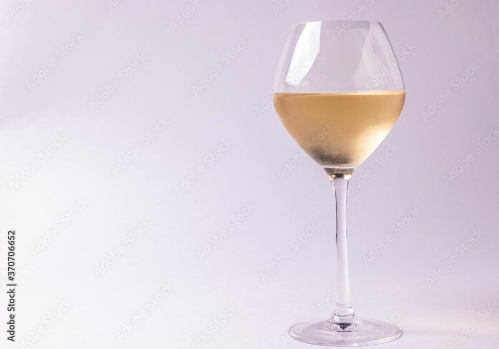 a glass of natural white wine a glass of natural white wine