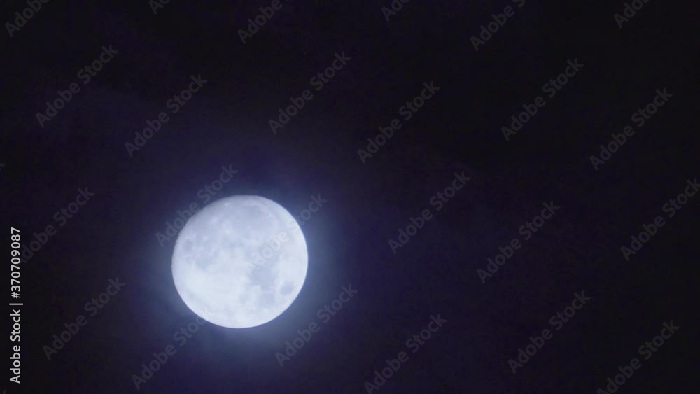 The near full moon in the night in the beautiful natural sky. The near full moon in the night in the beautiful natural sky.