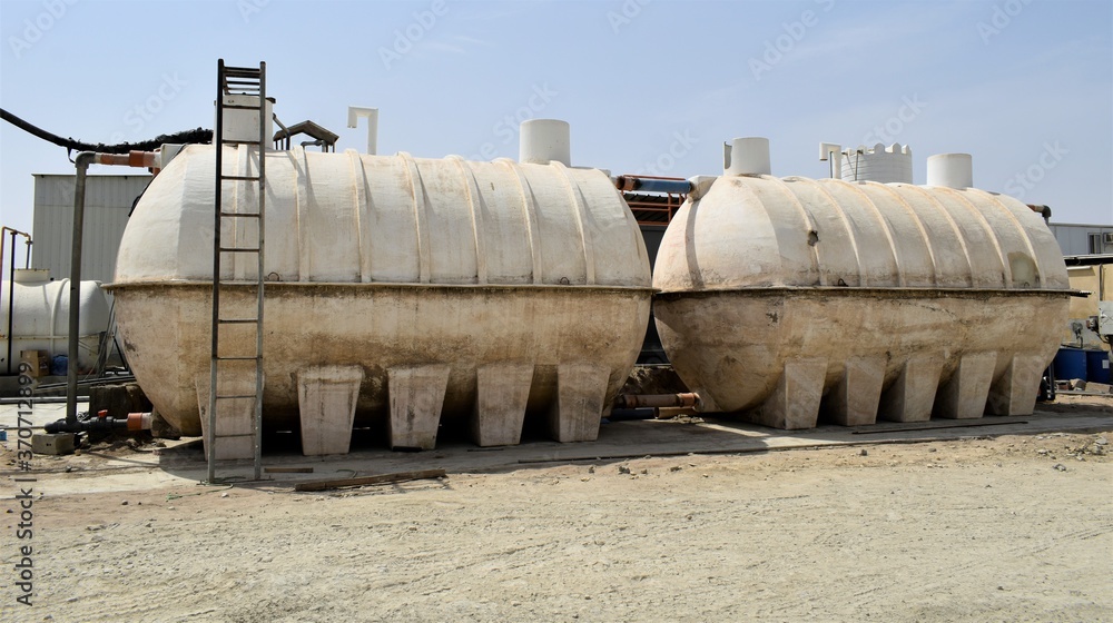 big white water tank in the construction site big white water tank in the construction site