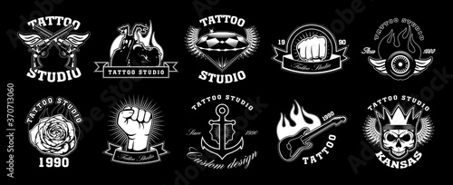 Tattoo studio emblems set. Vintage logo templates with crossed gun, rose, skeleton, anchor, diamond, bike. Monochrome vector illustrations isolated on black background