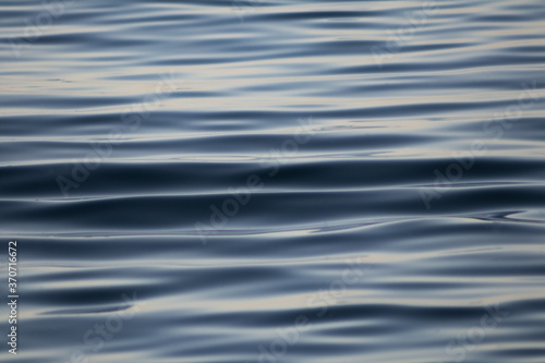 ripples on the sea surface, calm waves