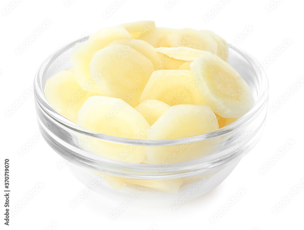 Pieces of raw carrot in glass bowl isolated on white Pieces of raw carrot in glass bowl isolated on white