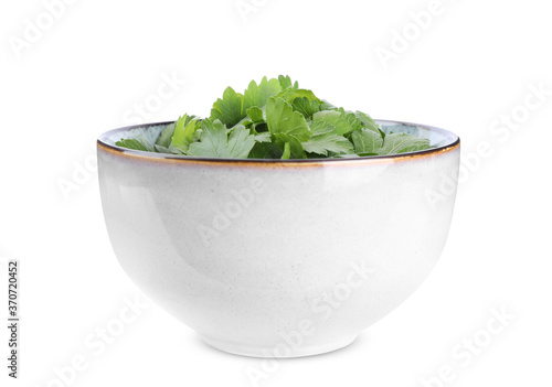Fresh green parsley in bowl isolated on white