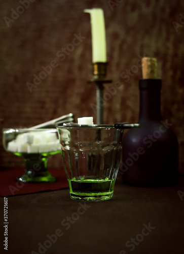 composition with absinthe and Antiques