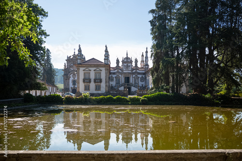 View of the Solar de Mateus exterior building, lake with building reflection