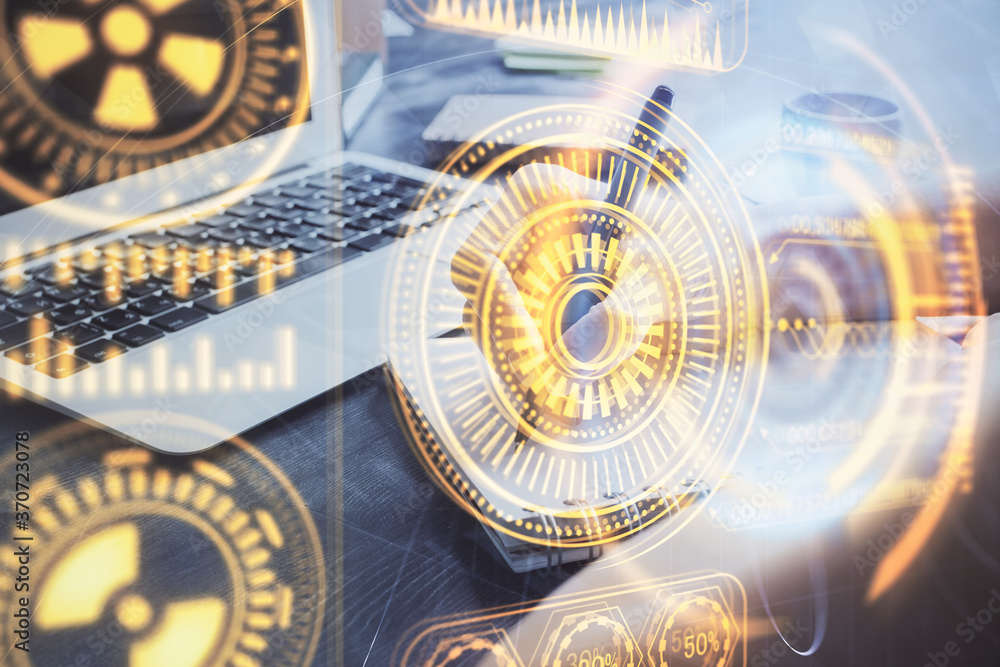 Fototapeta premium Tech theme hologram over woman's hands taking notes background. Concept of hightech. Double exposure