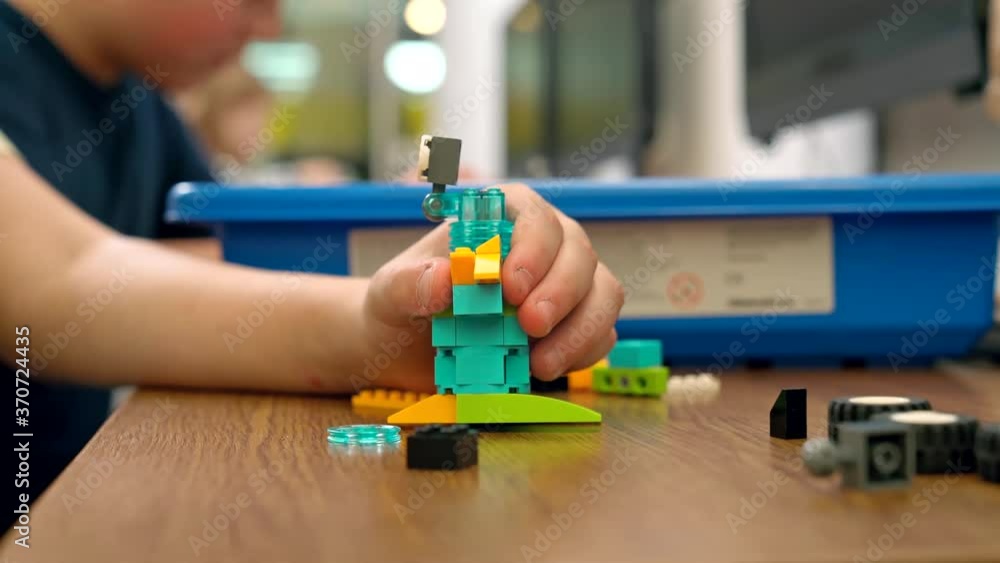 Incognito kid using building kit. Incognito kid using building kit.