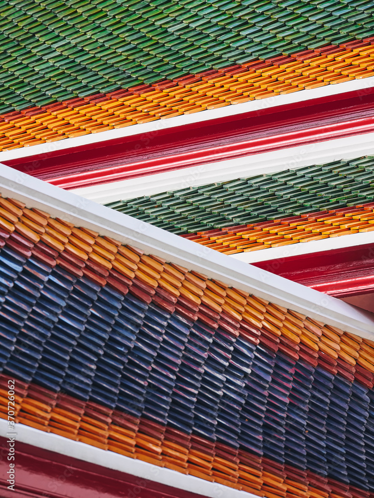 © VTT Studio - Thai Temple Architecture roof details Colourful Tiles decoration background © VTT Studio - Thai Temple Architecture roof details Colourful Tiles decoration background