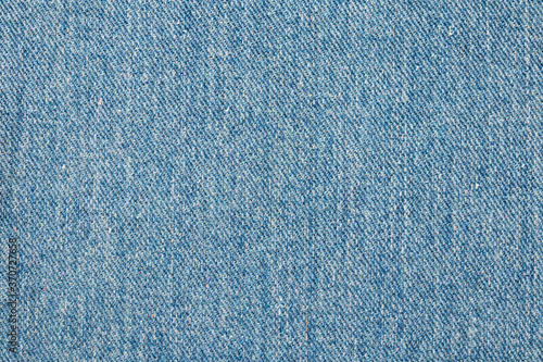 Denim blue jeans texture close up background top view