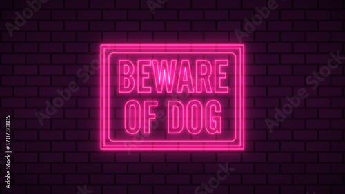 Beware of dog neon sign fluorescent light glowing on signboard background. Signs by neon lights in brick background. The best stock photo image of Beware of dog neon flickering, flash, blinking