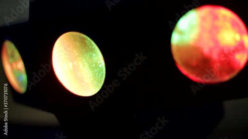 multi-colored lights during a party in blur, color music, defocus photo