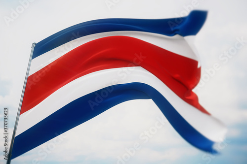 Waving flags of the world - flag of Costa Rica. Shot with a shallow depth of field, selective focus. 3D illustration.