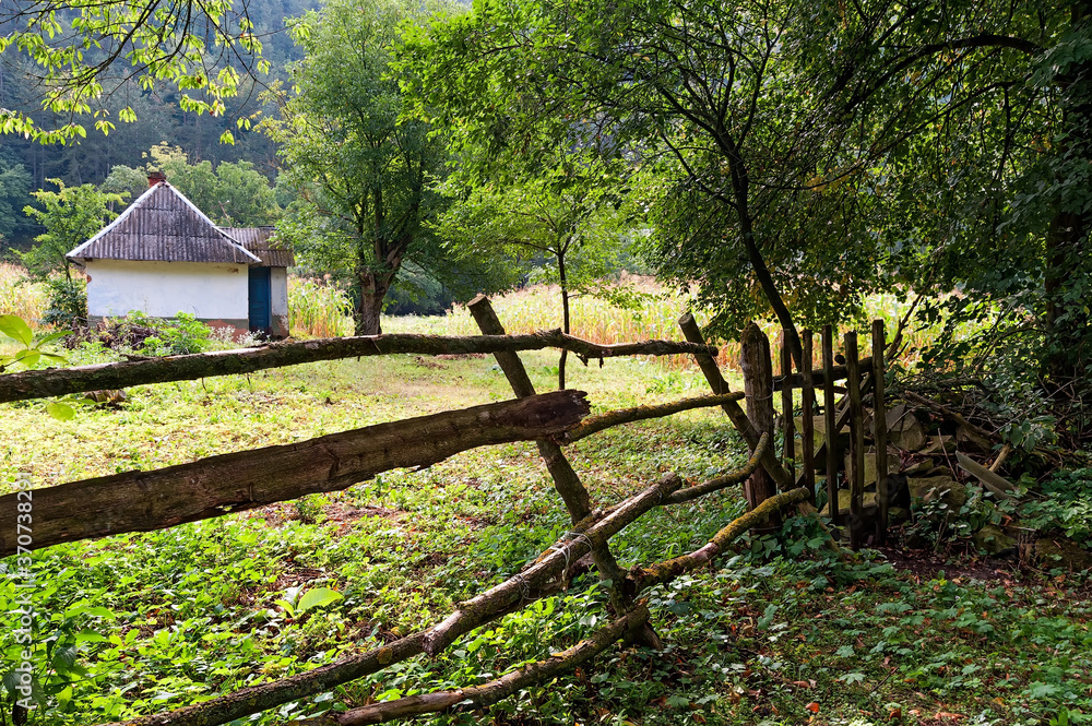 Ukrainian countryside landscape with wooden fence