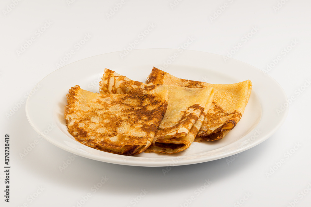 sweet pancakes on a white plate sweet pancakes on a white plate