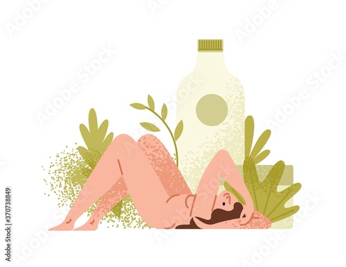 Naked woman lying near giant lotion bottle. Tropical palm leaves, nude girl, ...