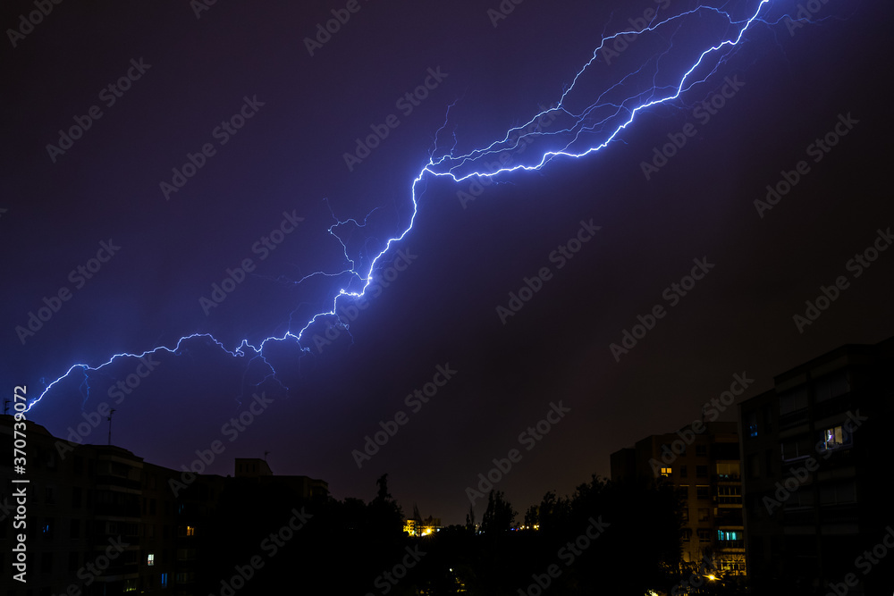 Naklejka premium Thunderbolts in the sky of Madrid