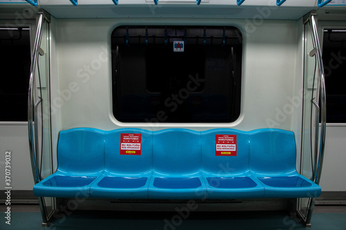 Empty view of metro train seats.