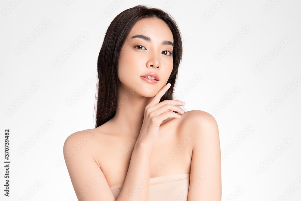Beautiful Young asian Woman with Clean Fresh Skin, on white background, Face care, Facial treatment, Cosmetology, beauty and spa, Asian women portrait Beautiful Young asian Woman with Clean Fresh Skin, on white background, Face care, Facial treatment, Cosmetology, beauty and spa, Asian women portrait