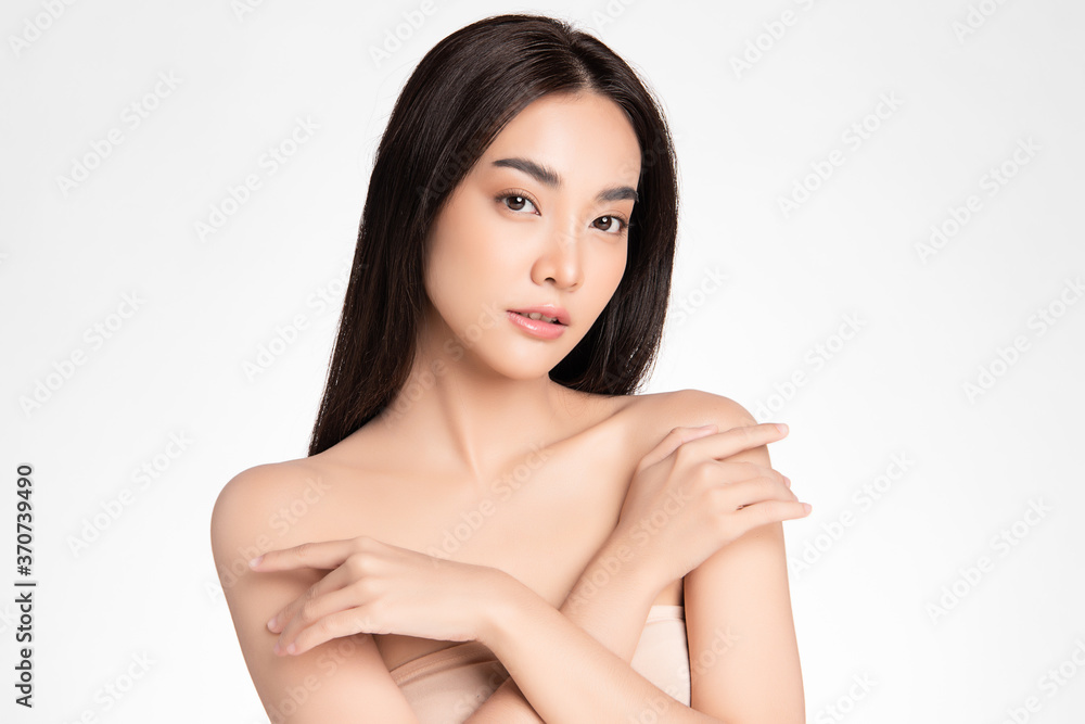 Beautiful Young asian Woman with Clean Fresh Skin, on white background, Face care, Facial treatment, Cosmetology, beauty and spa, Asian women portrait Beautiful Young asian Woman with Clean Fresh Skin, on white background, Face care, Facial treatment, Cosmetology, beauty and spa, Asian women portrait