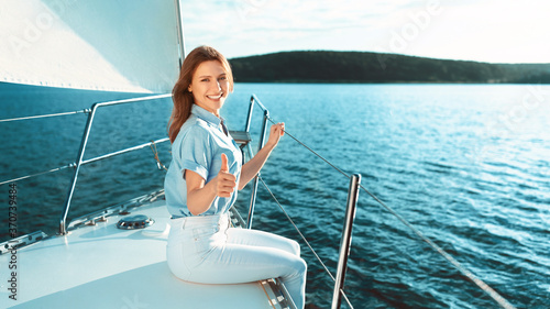 Woman Relaxing On Yacht Posing Sitting On Boat Deck Outdoor