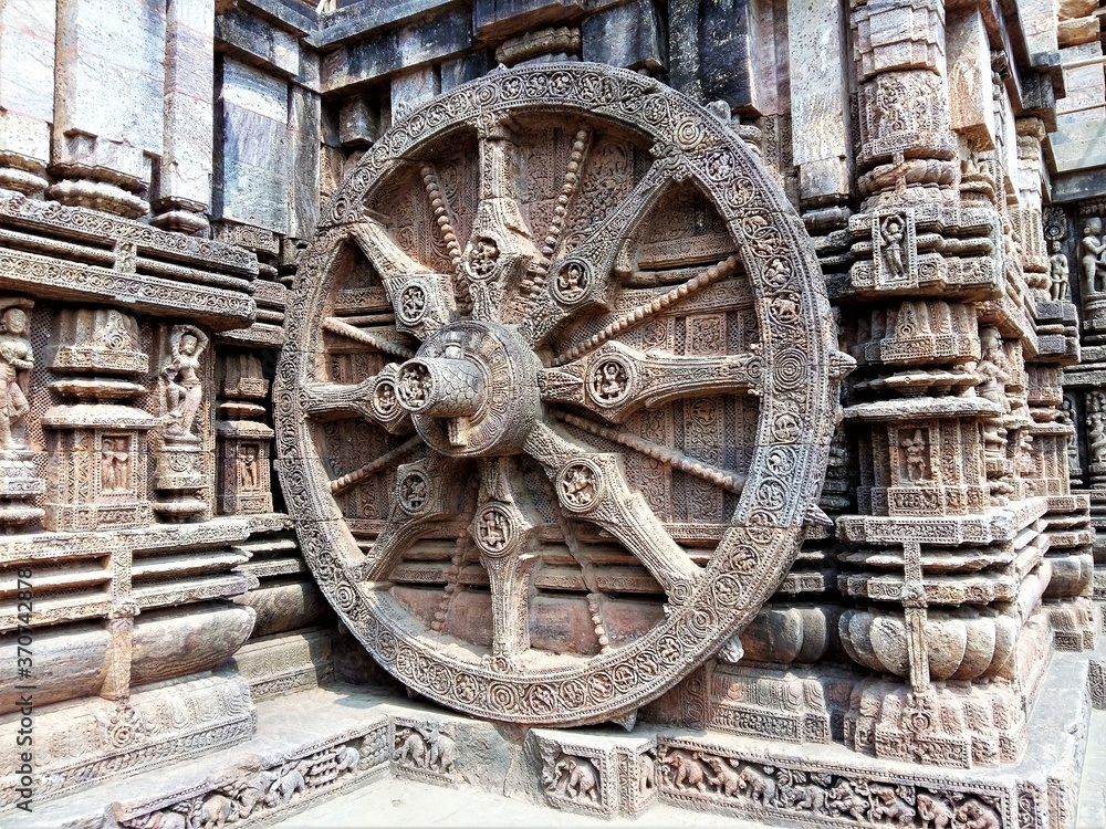 The Wheel of Sun Temple of Konark, India which doubles up as a sun dial. Ancient rock cut art of stone carving,An old monument declared world heritage by UNESCO.