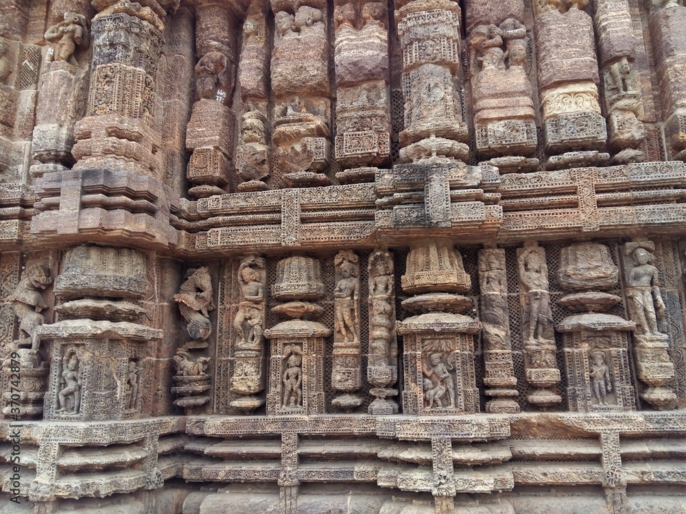  Ancient Sun Temple of Konark, India. Rock cut art on the walls ,mythical characters dancing and people are portrayed