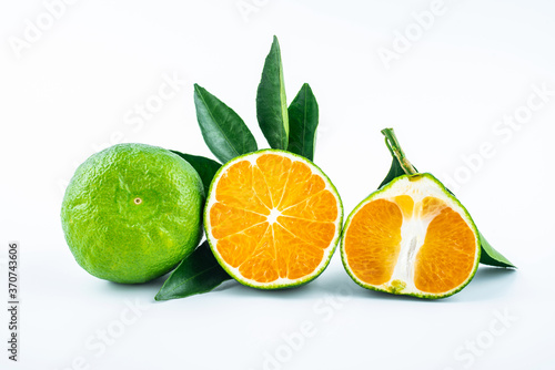 Fresh oranges on white background