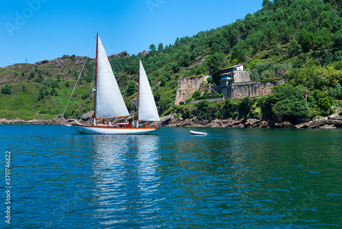 Lucretia Sailing boat  traditional wooden sloop  Pasaia Donibane town  Jaizkibel Mountain range   Gipuzkoa province  Basque Country  Spain  Europe