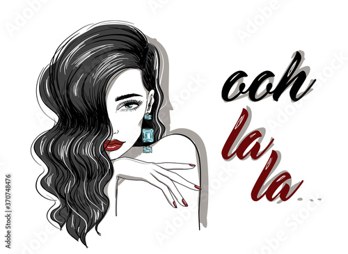 brunette woman with diamond earring holliwood waves