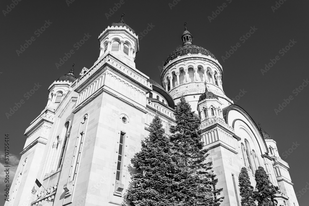 The orthodox cathedral in Cluj Napoca, Transylvania, Romania. Cathedral of the Dormition of the Theotokos or Dormition of the Mother of God built in Brancovenesc style on the Avram Iancu Square The orthodox cathedral in Cluj Napoca, Transylvania, Romania. Cathedral of the Dormition of the Theotokos or Dormition of the Mother of God built in Brancovenesc style on the Avram Iancu Square