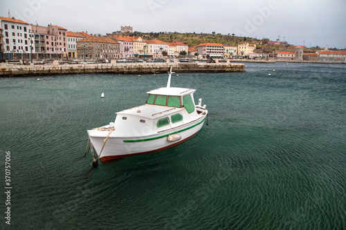 Wooden fishing boat in the port in front of Senj, Croatia