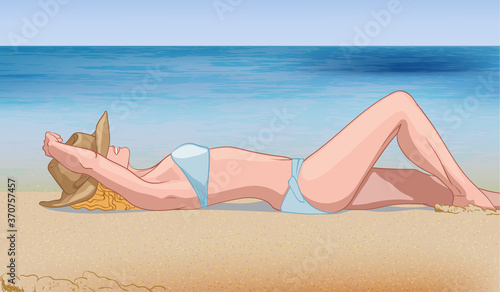 Young blonde woman in blue swimsuit and hat laying on the beach near the water. Relaxing in nature