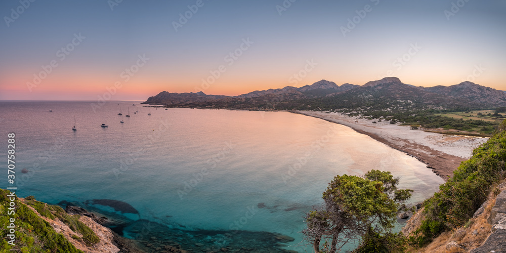 Dawn breaking at Ostriconi beach in Corsica