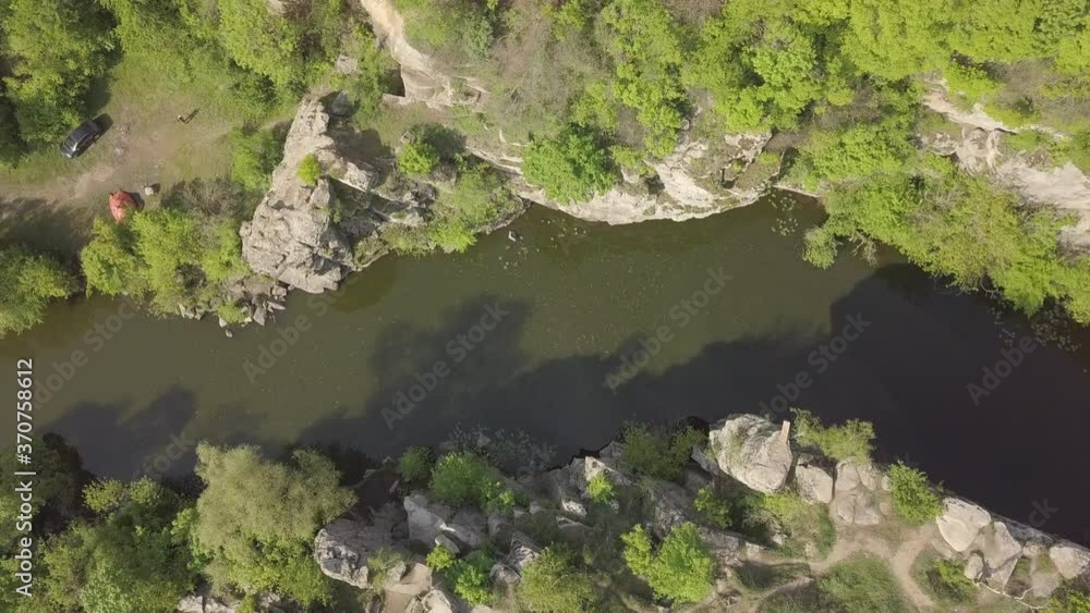 Aerial top view to Buky Canyon on river Hirskyi Tikich , Cherkassy region, Ukraine. Famous ukranian landscape and touristic places Aerial top view to Buky Canyon on river Hirskyi Tikich , Cherkassy region, Ukraine. Famous ukranian landscape and touristic places