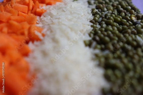 The resemblence of tri colored Indian map with food items like carrot, rice, green gram. For the occasion of Indian Independence day  photo