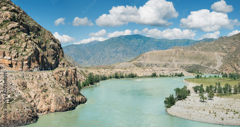 Katun river in the Altai mountains. Scenic panoramic view. Travel and summer vacation. Katun river in the Altai mountains. Scenic panoramic view. Travel and summer vacation.