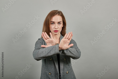 Let's make a stop I don't want to listen your lie. Unhappy depressed unsatisfied troubled annoyed, hold hands crossed showing negative reaction say no killing animals volunteer, holding demonstrating