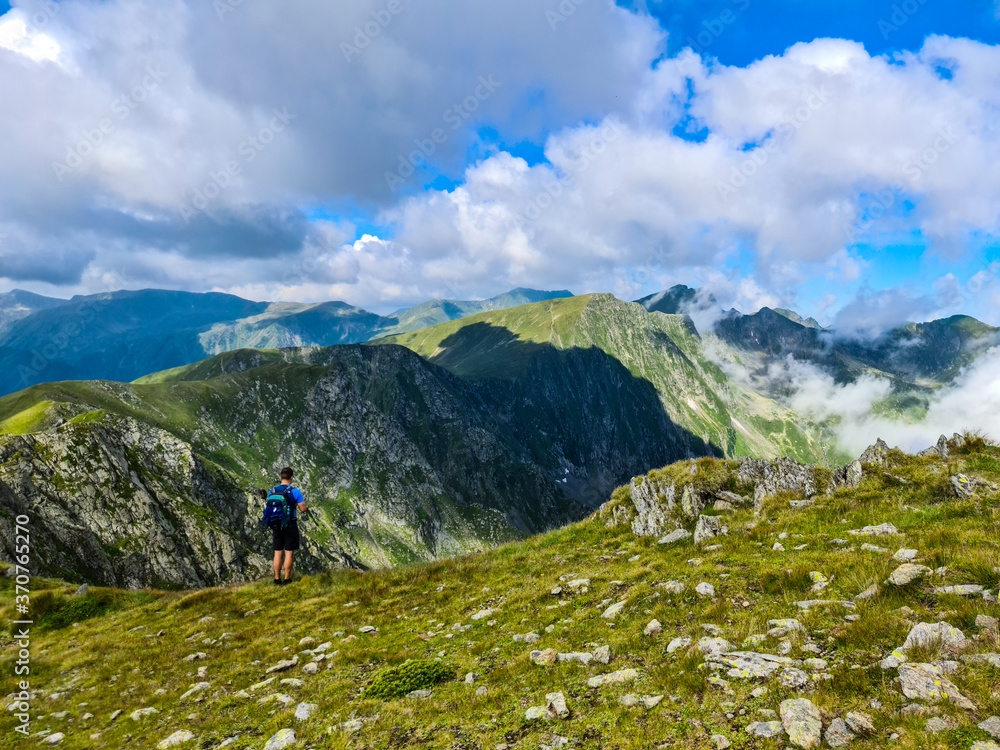 Hikers on The Key of the Banda Peak, Fagaras Mountains, Romania